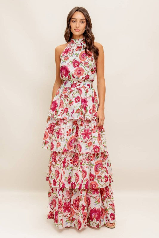 Sleeveless printed woven maxi dress featuring halter neckline, layered skirt and smocked back waistband