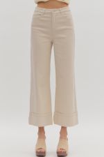 Solid mid-rise ankle length pants featuring zip-fly button closure and classic jean pockets