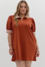 Solid short sleeve pullover polo dress featuring contrasting ruffle neck and sleeve band and pockets
