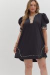 Solid pleated short puff sleeve mini dress featuring animal pattern contrast detail. Side Pockets