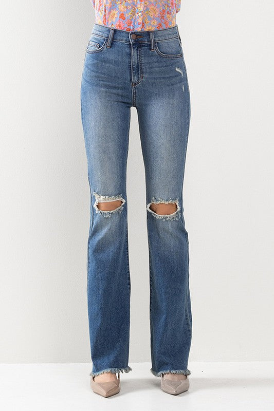 High Rise Bootcut Destressed Jeans with Fray Hem