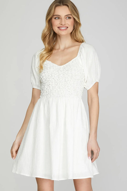 SHORT SLEEVE WOVEN MINI DRESS WITH TEXTURED DETAIL