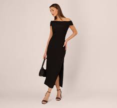 Short Off the shoulder neckline, fitted silhouette, and a long skirt with slit side.