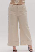 Solid mid-rise ankle length pants featuring zip-fly button closure and classic jean pockets